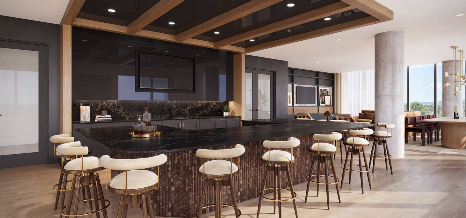 Elegant lounge area with a curved green velvet sofa, modern armchairs, decorative lighting, and a cozy ambiance, designed for relaxation and socializing.