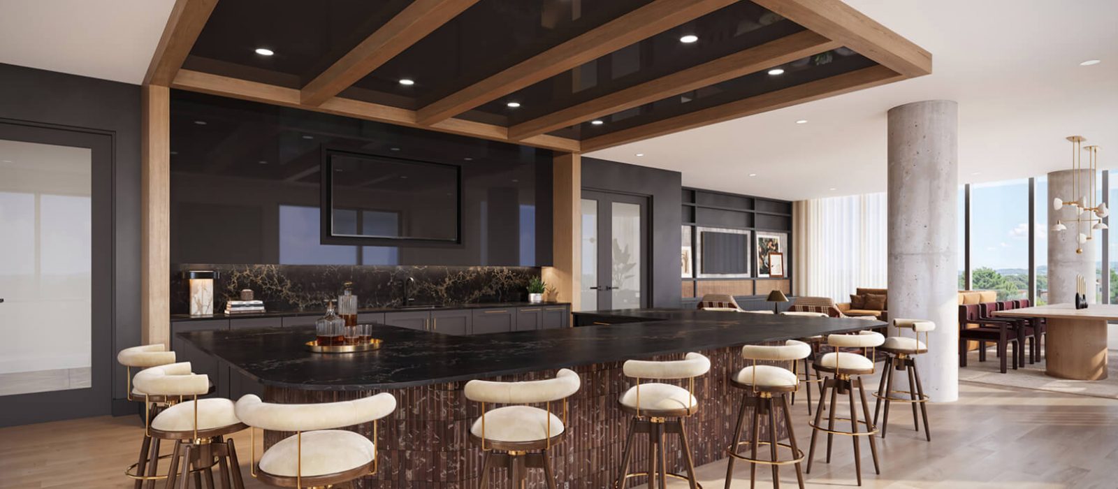 Elegant lounge area with a curved green velvet sofa, modern armchairs, decorative lighting, and a cozy ambiance, designed for relaxation and socializing.