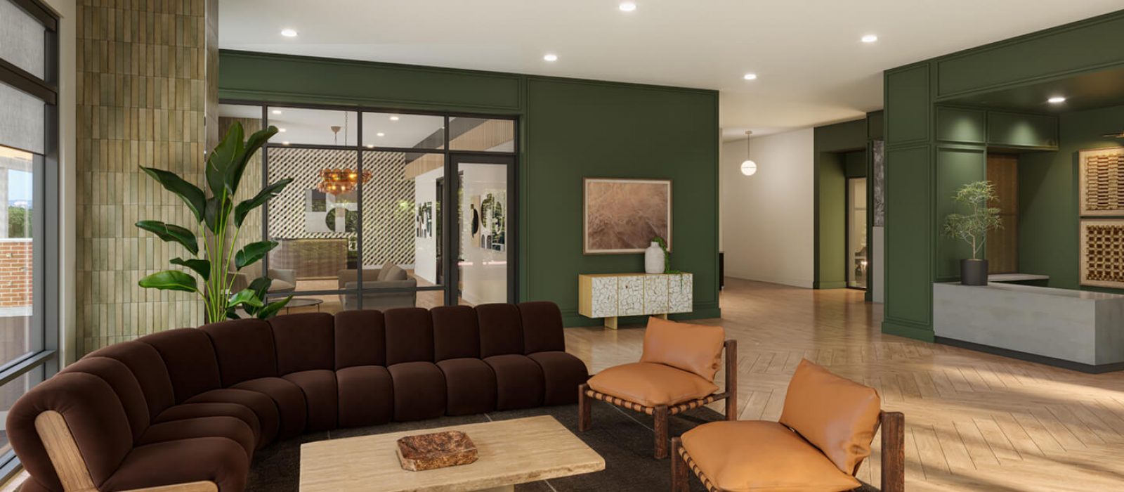 Elegant lobby with clean, modern architecture, featuring a mix of seating options, large windows, and tasteful design elements, creating a welcoming entry.